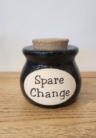 Spare change pottery jar