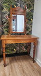 Antique dressing table with carved mirror