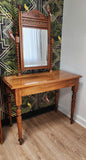 Antique dressing table with carved mirror